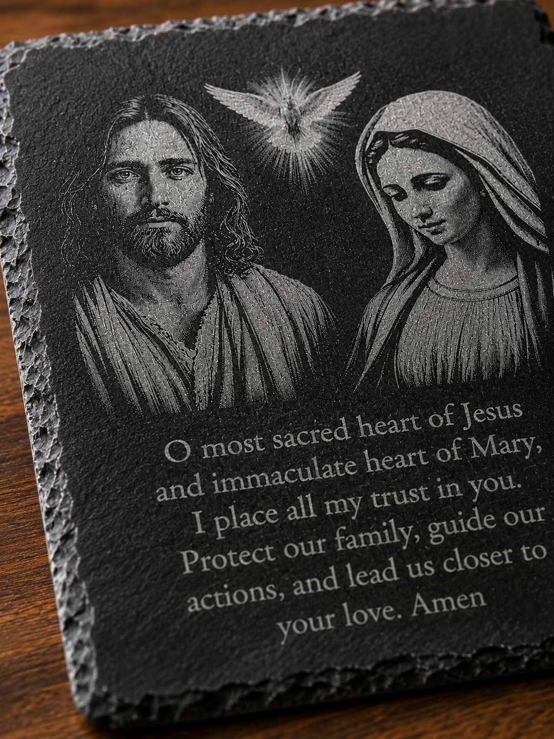 Close-up of the laser engraving and natural slate edge on the Sacred Heart of Jesus and Immaculate Heart of Mary prayer plaque.