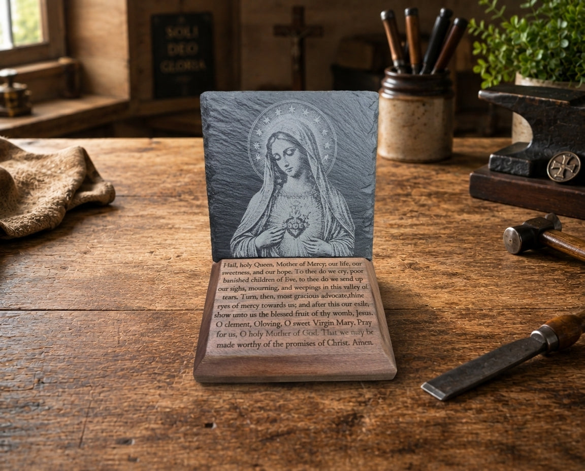 Close view of Immaculate Heart of Mary engraving, natural slate edges, and handcrafted Salve Regina black walnut base.