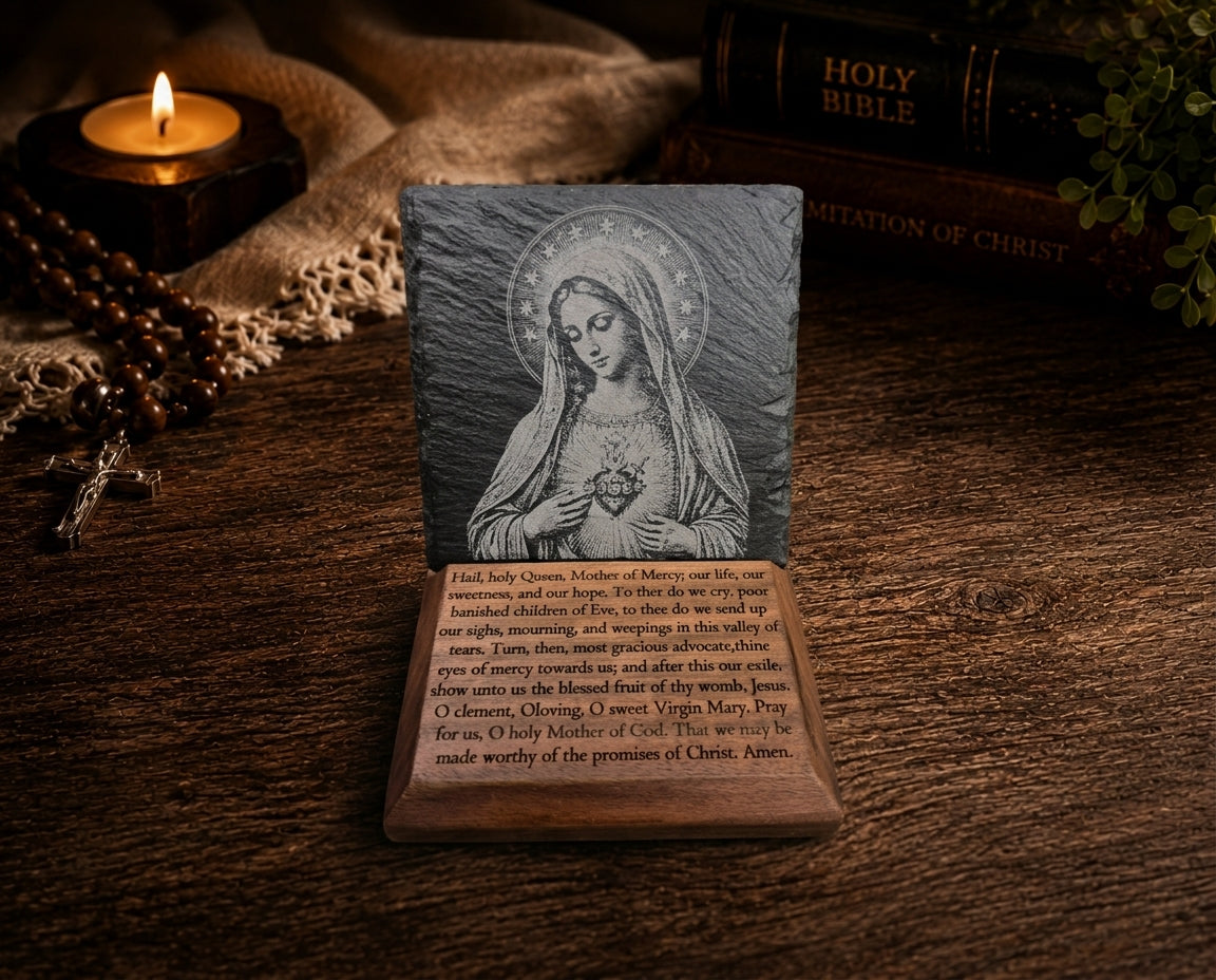 Detailed Immaculate Heart of Mary slate engraving with Salve Regina prayer on finished black walnut.