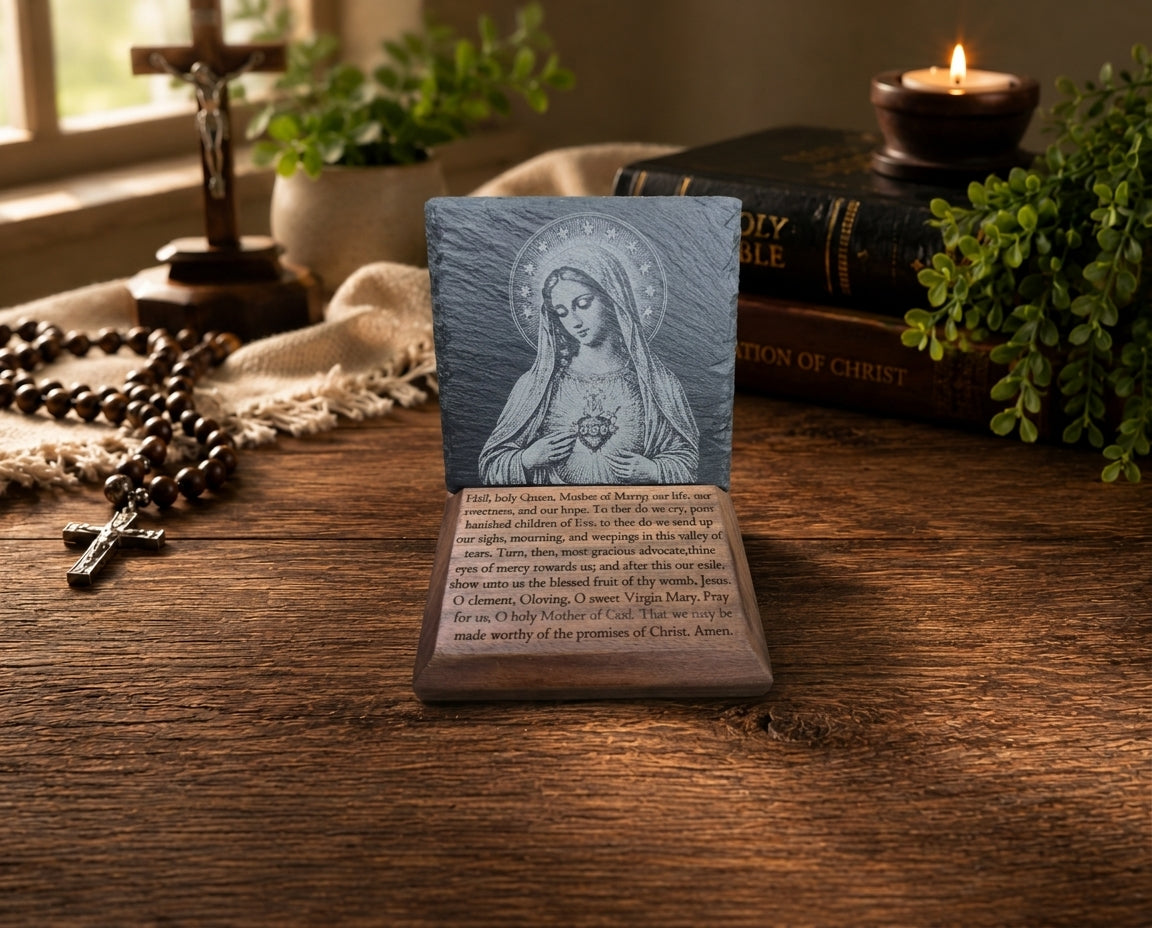 Immaculate Heart of Mary slate plaque with Salve Regina black walnut base displayed in a Catholic devotional space.