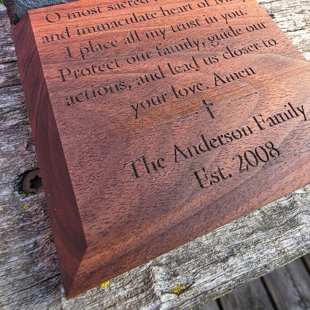 Close-up of personalized engraving on solid black walnut Catholic prayer tablet base