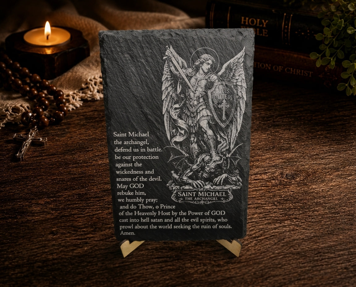 Detailed Saint Michael the Archangel artwork and prayer laser engraved on natural black slate.